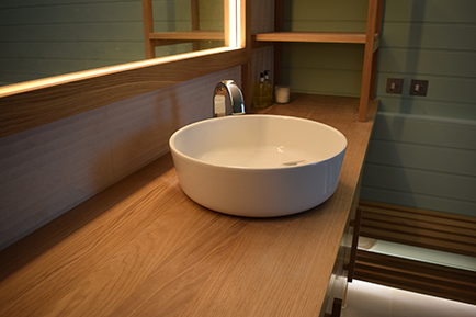 Solid Oak worktop to complete the bathroom vanity manufactured by Touch Bespoke Joinery