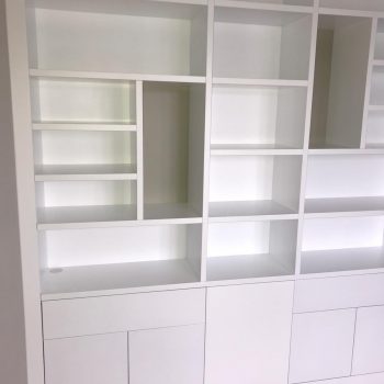 Bookcase with staggered shelving and divisions manufactured by Touch Bespoke Joinery image 3