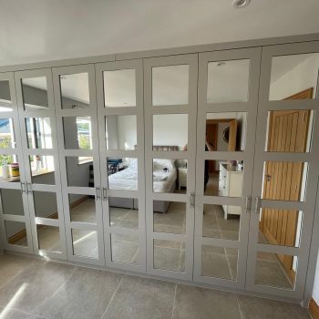 Bespoke wardrobes and shaker style doors with mirror inlays