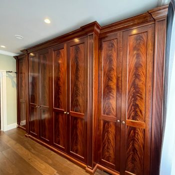 Bespoke Wardrobes with Mahogany Curl doors fitted in Pimlico London