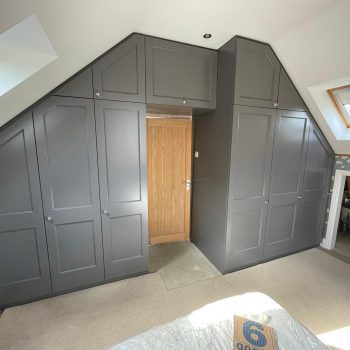 Bespoke wardrobes manufactured to suit roof pitch Egger MFC Carcases with painted doors