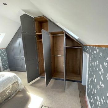 Bespoke wardrobes manufactured to suit roof pitch using every bit of space for storage