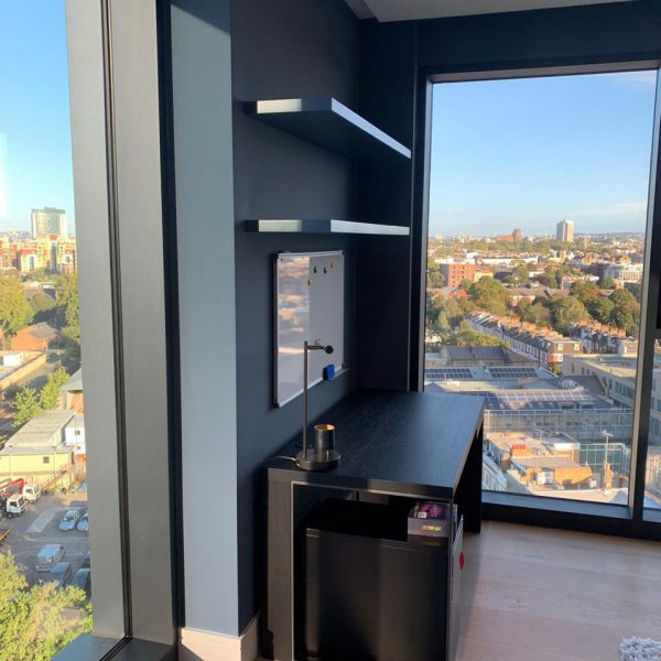 Floating shelves in bedroom overlooking Chelsea in London