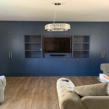 Media wall Finished sprayed dark blue fitted in Harlow Essex